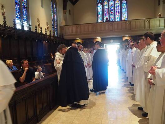 A Dominican hug-a-thon after their vows.