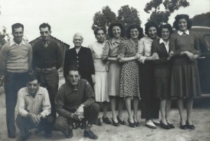 The last time the Gularte children were together, 1944. Frank, in uniform, in front of his mother, would be killed in action in November 1944. Just above him is Manuel, who would serve as an artilleryman and survive the war. Joe and Tony, at left, would run the family farm during the war; Mrs. Clara Gularte is flanked by her six daughters: Mary, Edwina, Clara, Rose, Annie, and Barbara. Photo courtesy Annie Gularte Silva. 